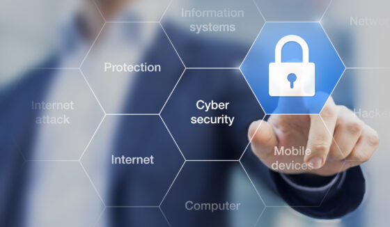 70543618_m 70543618 - cyber security concept on virtual screen with a consultant doing presentation in the background